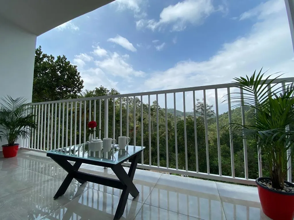 Rainwood Aurum Resort Munnar Indie